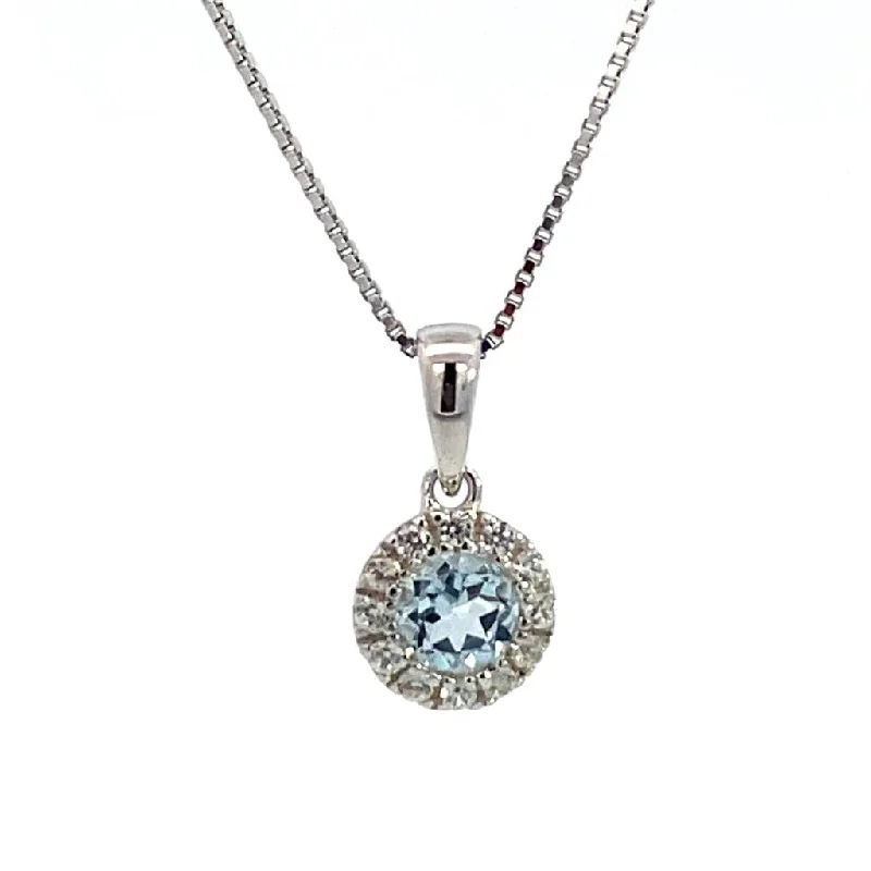 Ruby Necklaces-March Birthstone Pendant: Sterling Silver Sky Topaz Halo Pendant Necklace